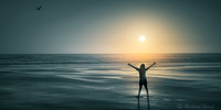 silhouette at sunset over pacific ocean arms open fine art seascape by Richard Horst Photography