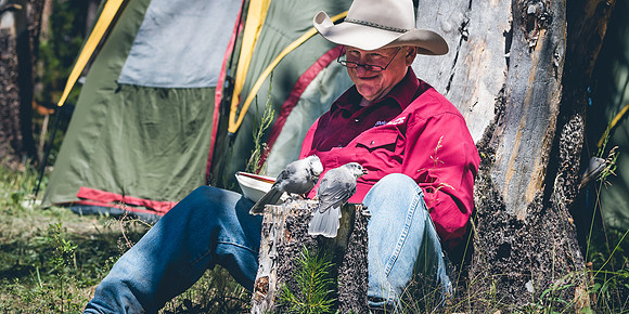 cowboy resting at camp with tent in background fine art western photograph by Richard Horst